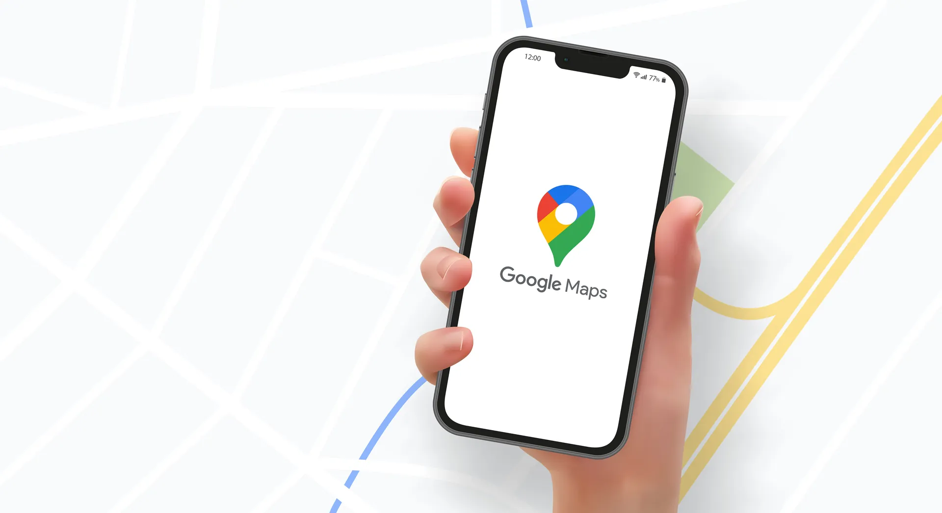 A hand holding a phone showing Google Maps, over a map — connecting your Google Business Profile to Google Analytics 4