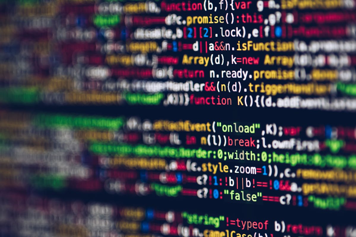 Colorful lines of structured code on a dark screen