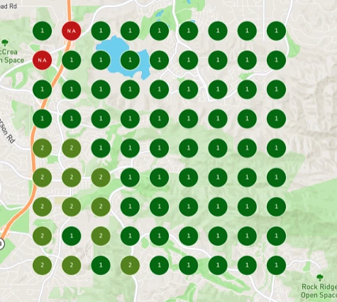 Geo-grid rank tracking map showing a business ranked #1 (green) across most points in its service area